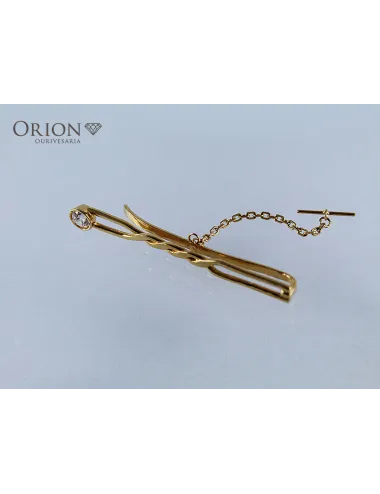 Alfinete em ouro usado