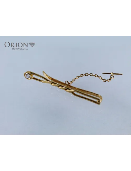 Alfinete em ouro usado